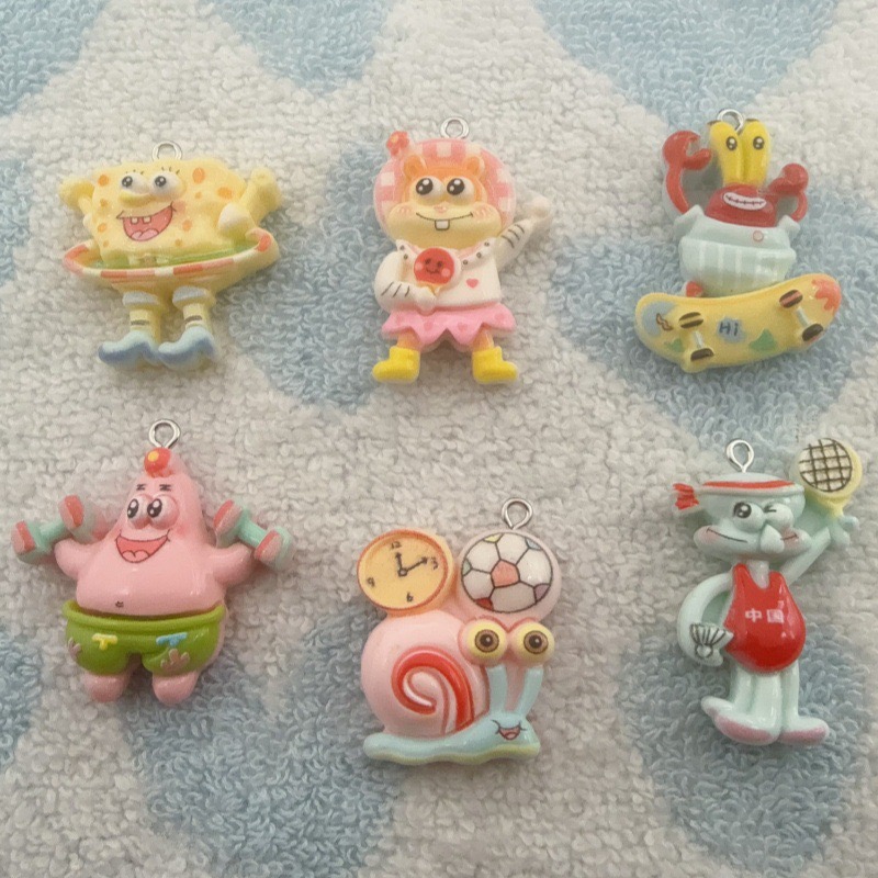 Resin - 10 pendenti in resina a forma