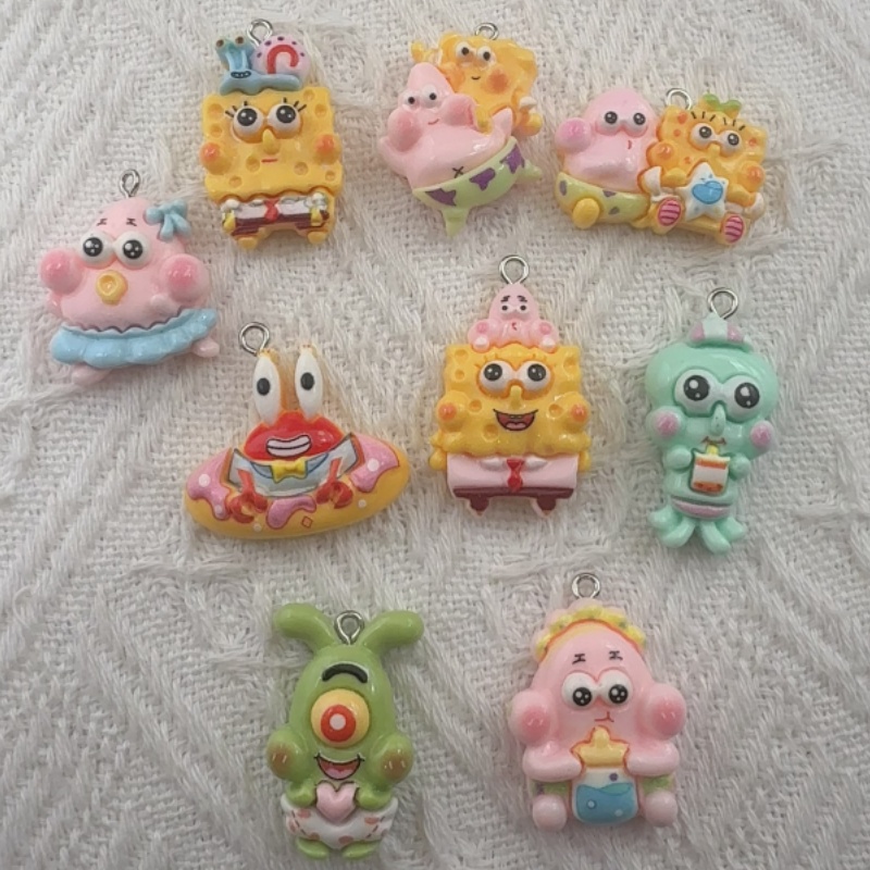 Resin - 10 pendenti in resina a forma
