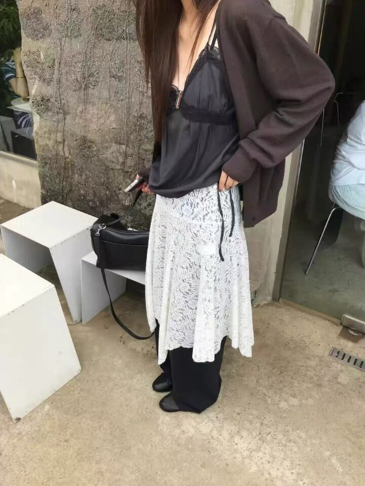 Top a strati con scollo a V al - Resin Vat recensione e prezzo